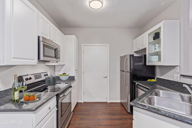 kitchen with white cabinets and dark wood-type flooring