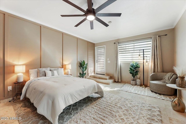 2923 N 63rd St, Mesa, AZ 85215 - bedroom with ceiling fan, a decorative wall, and crown molding