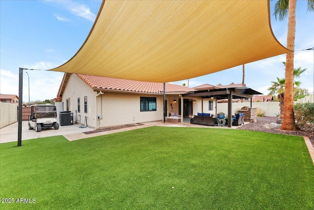 2923 N 63rd St, Mesa, AZ 85215 - rear view of house with an outdoor living space, a patio area, a tiled roof, and a fenced backyard