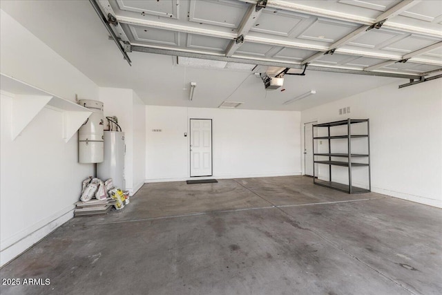 2923 N 63rd St, Mesa, AZ 85215 - garage featuring water heater, baseboards, visible vents, and a garage door opener