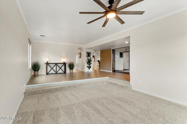 2923 N 63rd St, Mesa, AZ 85215 - spare room featuring carpet, baseboards, ceiling fan, and crown molding