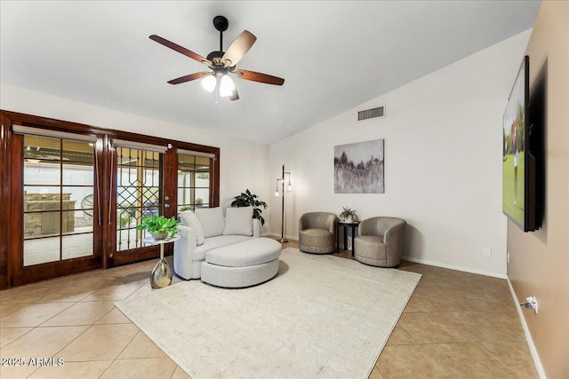 2923 N 63rd St, Mesa, AZ 85215 - living area featuring lofted ceiling, light tile patterned flooring, visible vents, and baseboards