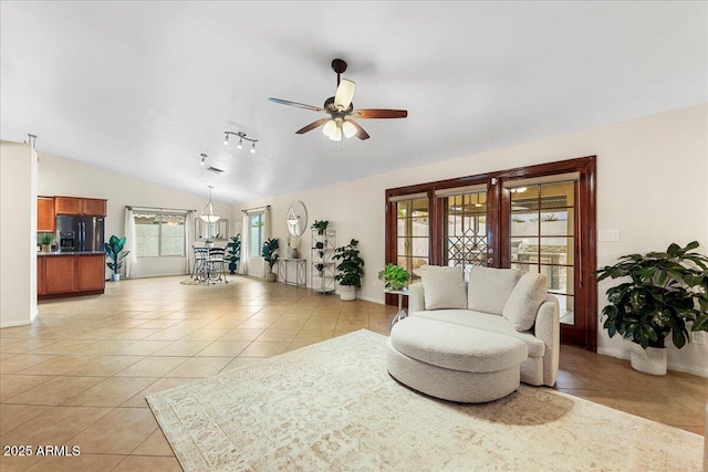 2923 N 63rd St, Mesa, AZ 85215 - sitting room featuring lofted ceiling, ceiling fan, light tile patterned flooring, and baseboards