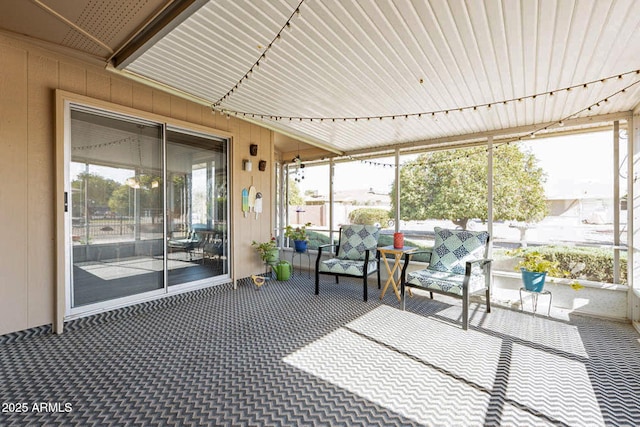 sunroom with track lighting