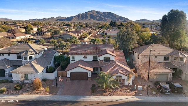 drone / aerial view featuring a mountain view and a residential view