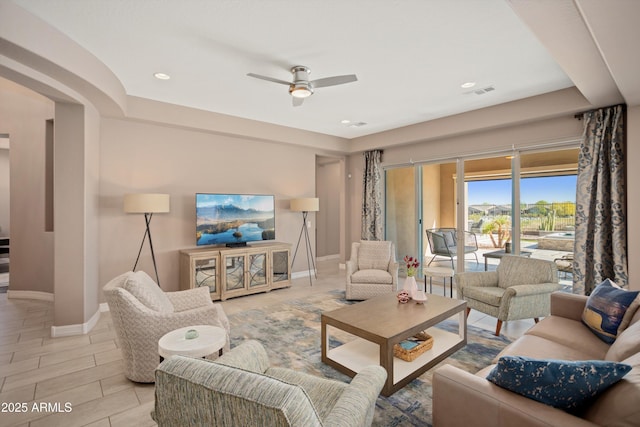 living area featuring visible vents, ceiling fan, recessed lighting, and baseboards