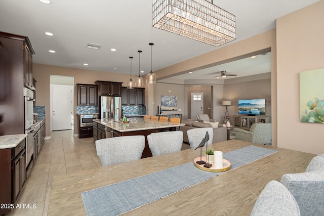 dining area featuring visible vents, recessed lighting, and a ceiling fan