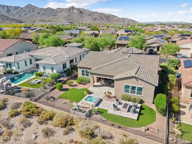 aerial view with a mountain view and a residential view