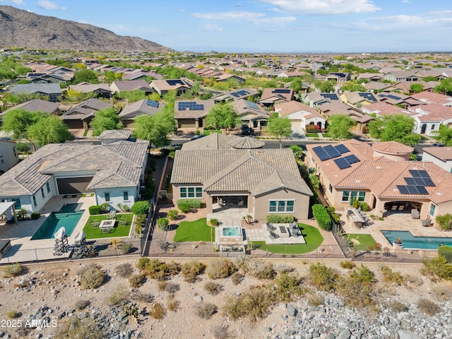 bird's eye view with a mountain view and a residential view