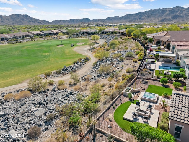 aerial view featuring a residential view, a mountain view, and view of golf course