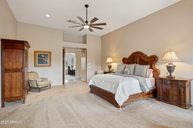 bedroom with recessed lighting, visible vents, ceiling fan, and light colored carpet