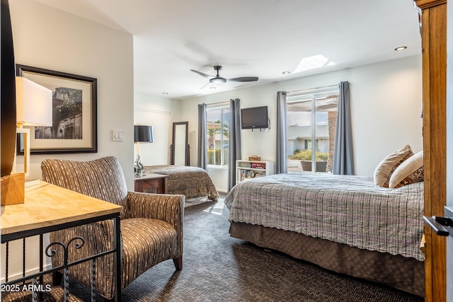 bedroom featuring ceiling fan and carpet floors