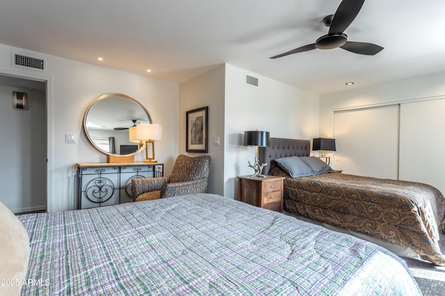 bedroom featuring ceiling fan and a closet