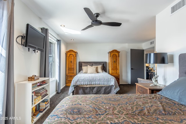 bedroom featuring ceiling fan, carpet, visible vents, and baseboards