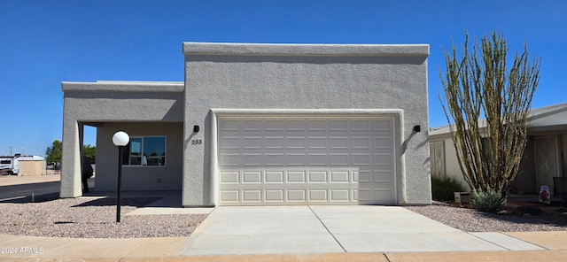 adobe home featuring a garage