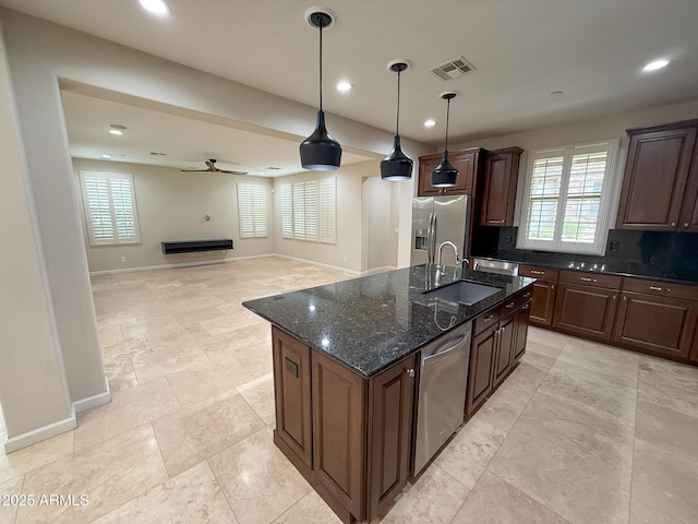 18515 N 94th St, Scottsdale, AZ 85255 - kitchen featuring visible vents, a sink, appliances with stainless steel finishes, and a healthy amount of sunlight