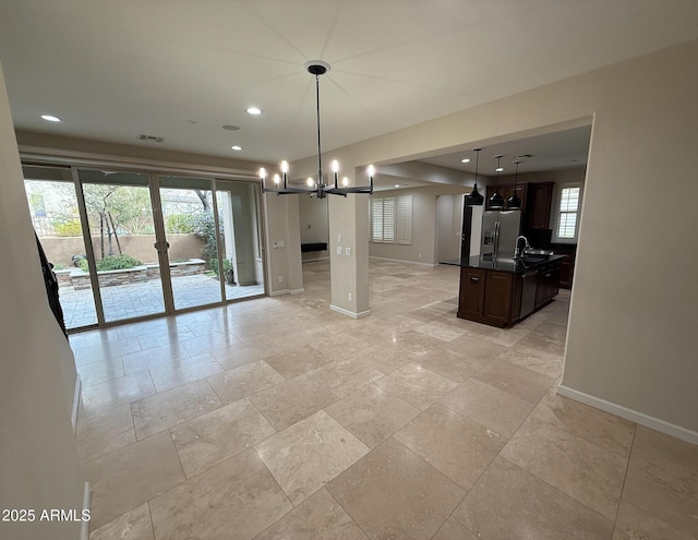 18515 N 94th St, Scottsdale, AZ 85255 - unfurnished dining area featuring a sink, visible vents, baseboards, a chandelier, and recessed lighting