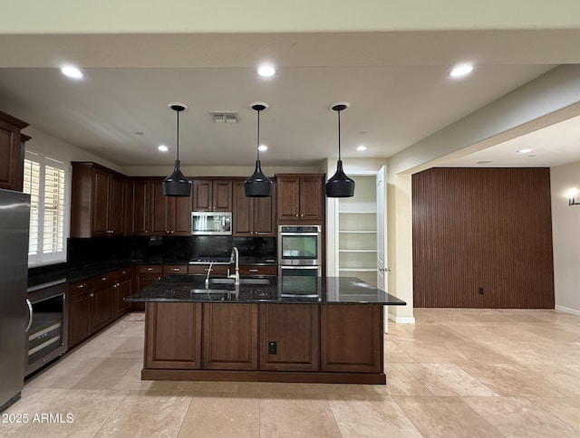18515 N 94th St, Scottsdale, AZ 85255 - kitchen with beverage cooler, visible vents, a sink, dark stone counters, and appliances with stainless steel finishes