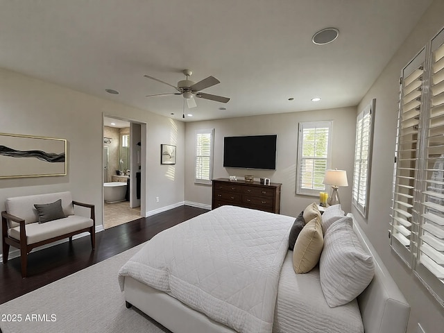 18515 N 94th St, Scottsdale, AZ 85255 - bedroom with a ceiling fan, connected bathroom, baseboards, dark wood-style floors, and recessed lighting