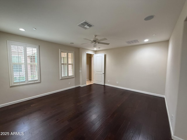 18515 N 94th St, Scottsdale, AZ 85255 - empty room featuring dark wood-type flooring, visible vents, a ceiling fan, and baseboards