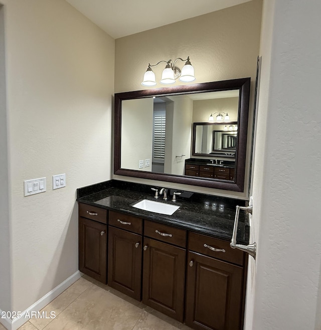18515 N 94th St, Scottsdale, AZ 85255 - bathroom with baseboards, a textured wall, vanity, and tile patterned flooring