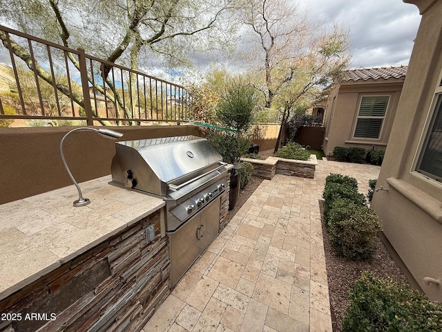 18515 N 94th St, Scottsdale, AZ 85255 - view of patio / terrace featuring grilling area, fence, an outdoor kitchen, and stairs