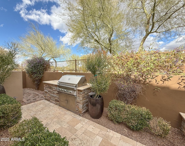 18515 N 94th St, Scottsdale, AZ 85255 - view of patio with exterior kitchen, grilling area, and fence