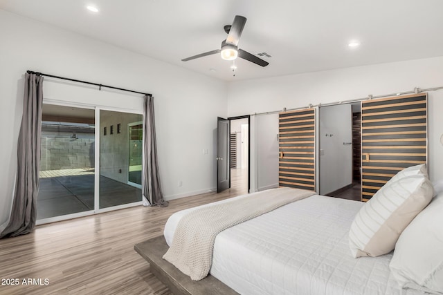 bedroom featuring access to outside, recessed lighting, wood finished floors, and visible vents