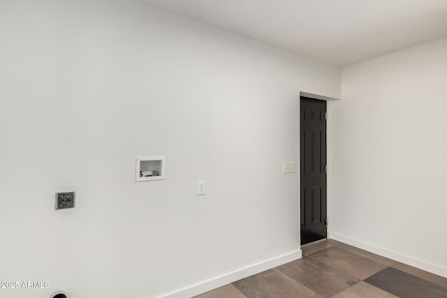 washroom featuring laundry area, baseboards, and hookup for a washing machine