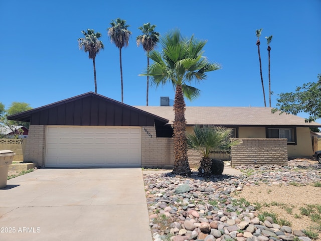 15602 N 55th Ave, Glendale, AZ 85306 - single story home with driveway, a garage, and brick siding