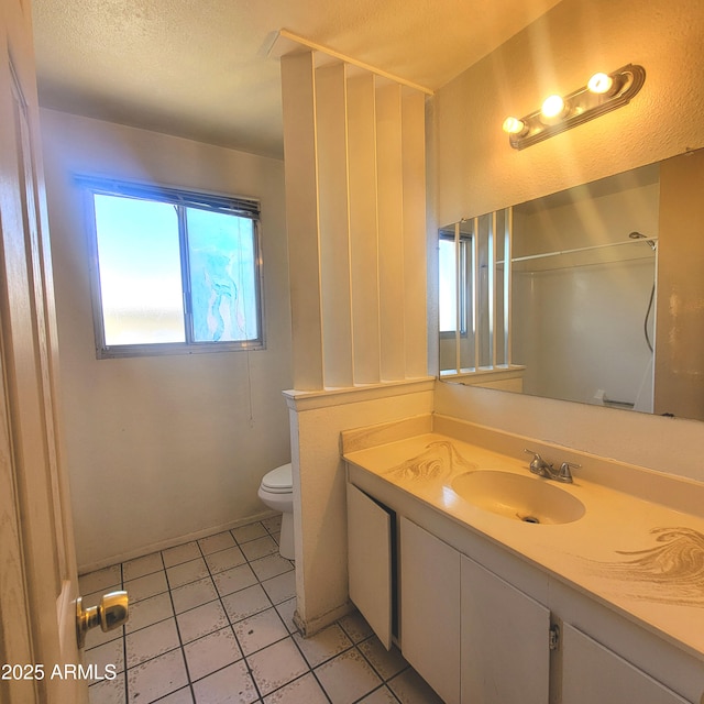 15602 N 55th Ave, Glendale, AZ 85306 - full bath with vanity, tile patterned floors, a shower, and a textured ceiling