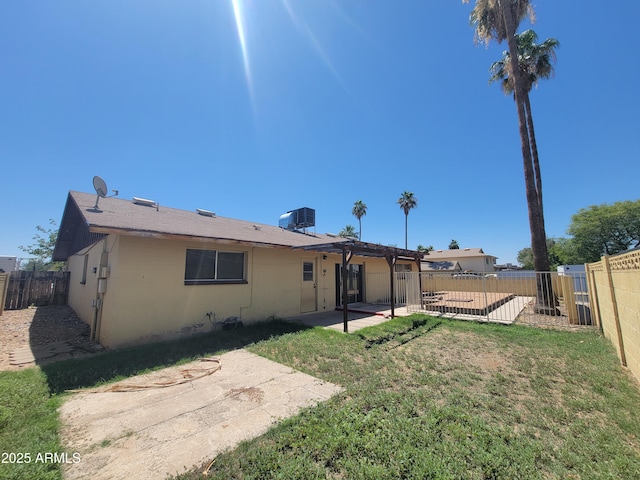 15602 N 55th Ave, Glendale, AZ 85306 - back of property featuring a patio, a fenced backyard, and a pergola