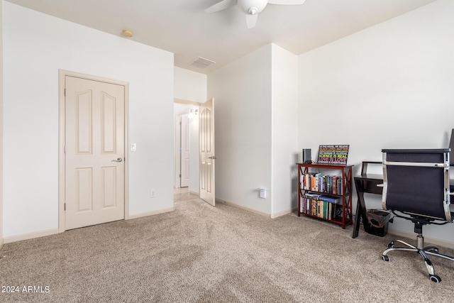 office space with ceiling fan and light colored carpet