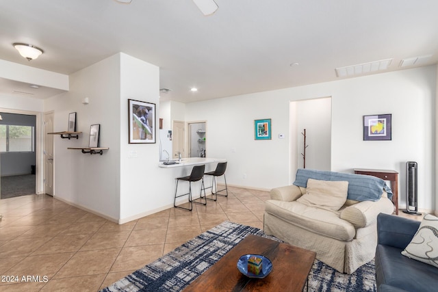 living room featuring light tile patterned floors