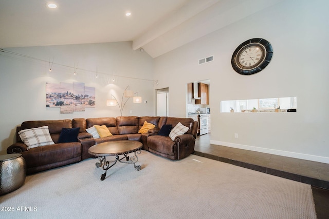 living area with beamed ceiling, visible vents, baseboards, recessed lighting, and high vaulted ceiling