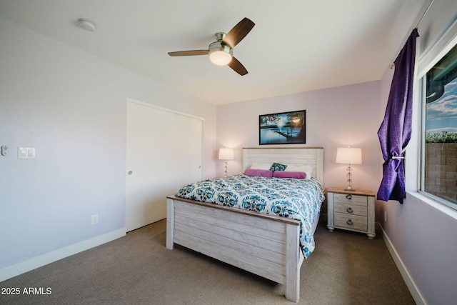 carpeted bedroom featuring ceiling fan and baseboards