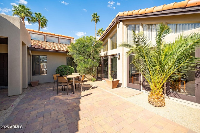 view of patio featuring outdoor dining area