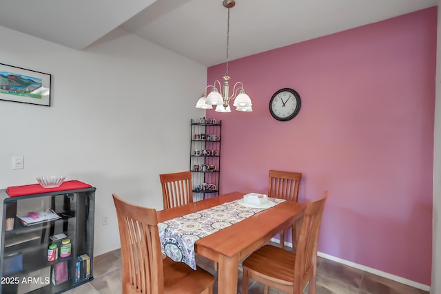 dining room featuring a notable chandelier