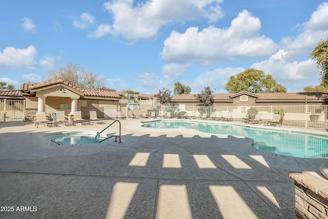 view of swimming pool featuring a patio