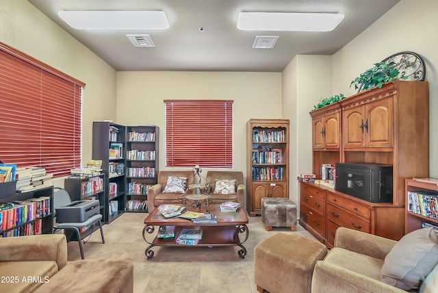 living room with light tile patterned flooring