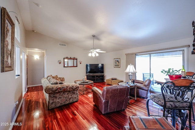 living room with ceiling fan, dark wood-type flooring, and lofted ceiling