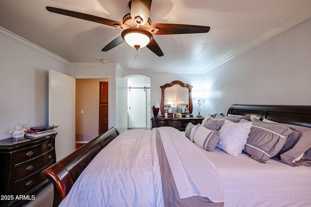 bedroom with ceiling fan and ornamental molding