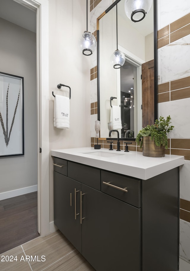 bathroom featuring vanity and hardwood / wood-style flooring