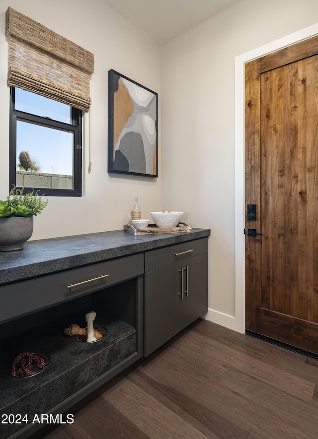 interior space with wood-type flooring and vanity