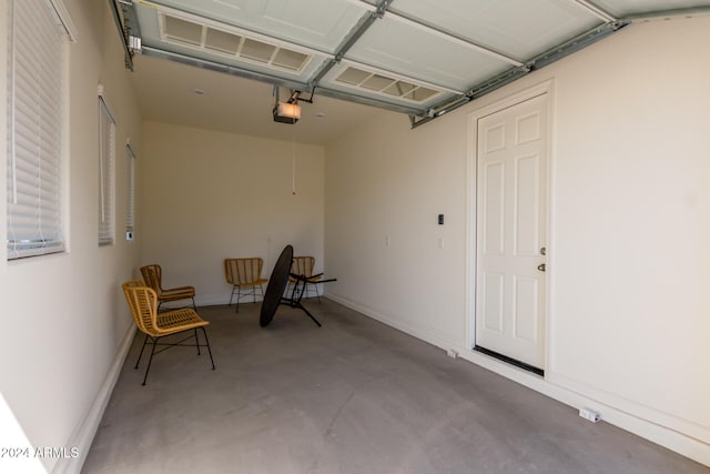 garage featuring a garage door opener