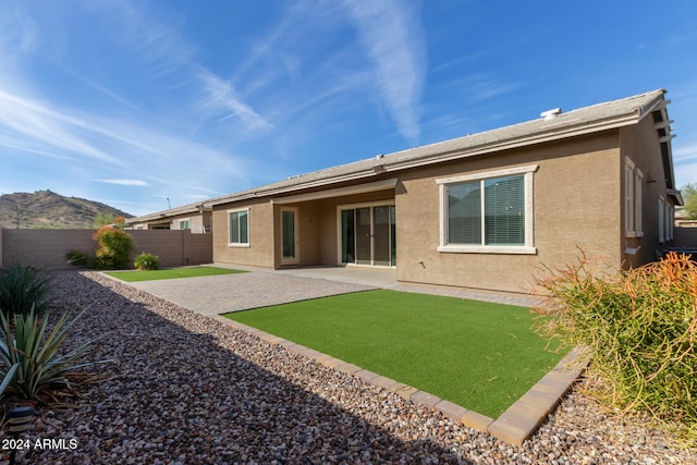 back of house featuring a patio