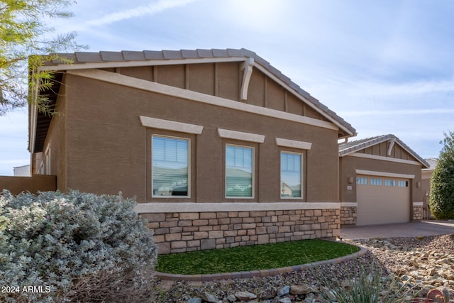 exterior space with a garage