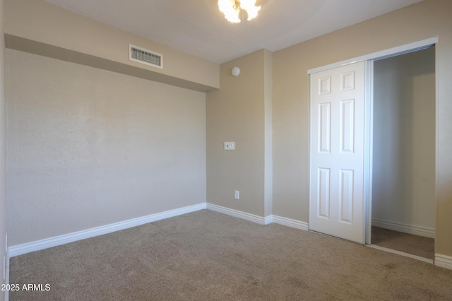 406 E Saguaro St, Casa Grande, AZ 85122 - unfurnished bedroom featuring carpet and a closet