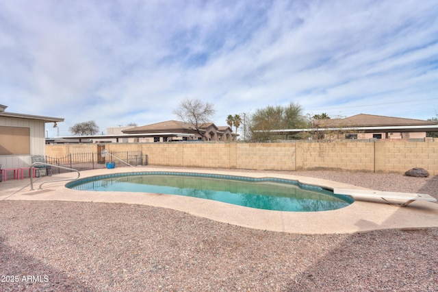 406 E Saguaro St, Casa Grande, AZ 85122 - view of swimming pool with a diving board and a patio area