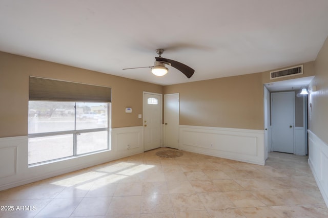 406 E Saguaro St, Casa Grande, AZ 85122 - empty room featuring light tile patterned floors and ceiling fan